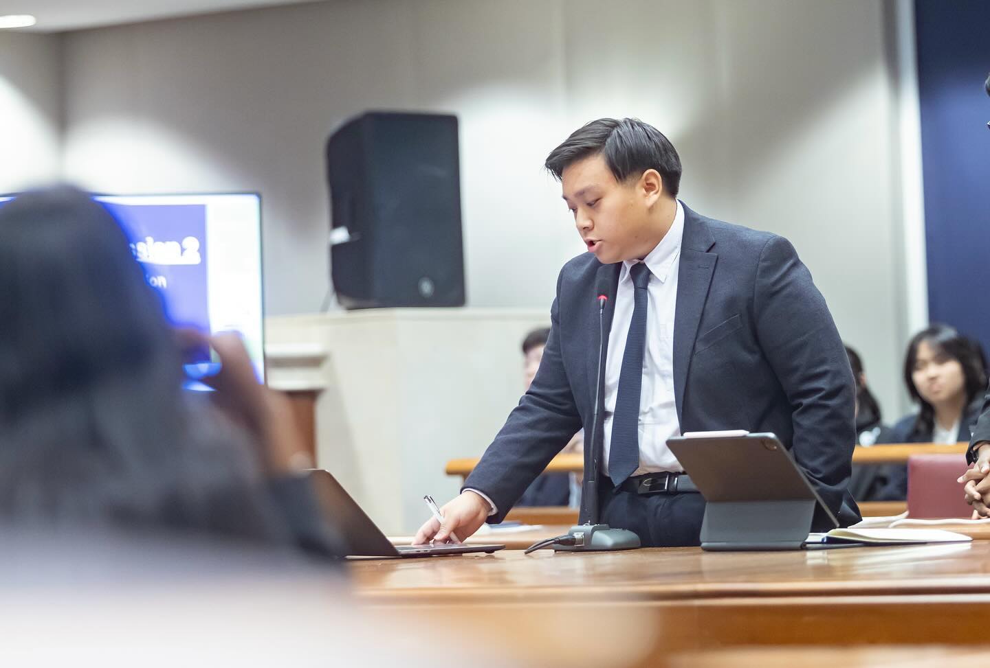 Image of Marcus debating at Singapore Model Parliament 2023